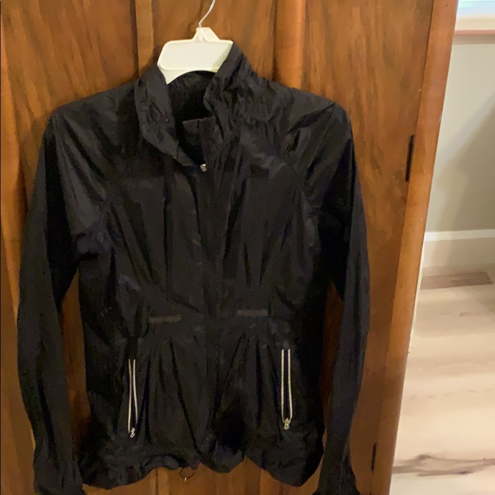 Black front zip nylon (rain) jacket,